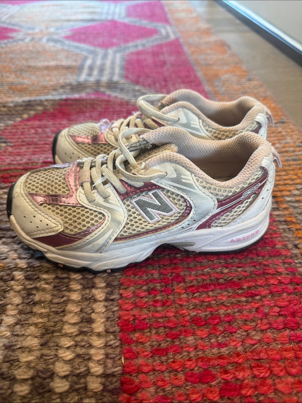 New Balance Kids White and Pink Mesh Athletic Sneakers